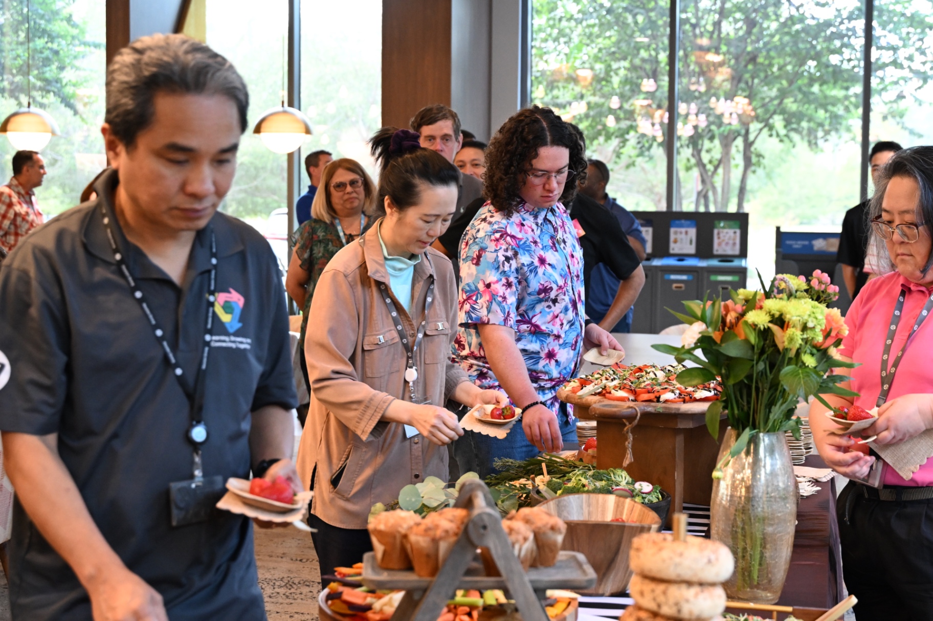 Guests serving themselves at a corporate grazing table